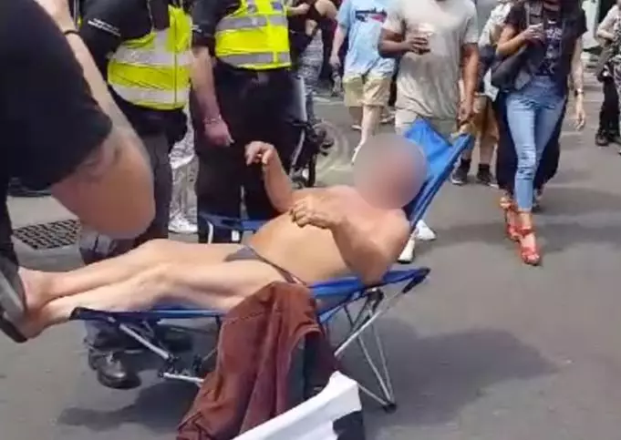 Man Wearing Speedos Is Arrested While Sitting On A Deckchair 