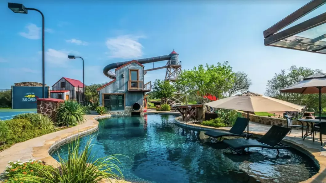 This Amazing Holiday Home Has Its Own Four-Storey Water Slide And Huge Pool