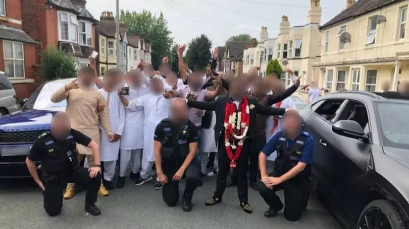 Cops Slammed After Ignoring Social Distancing To Pose With Wedding Guests