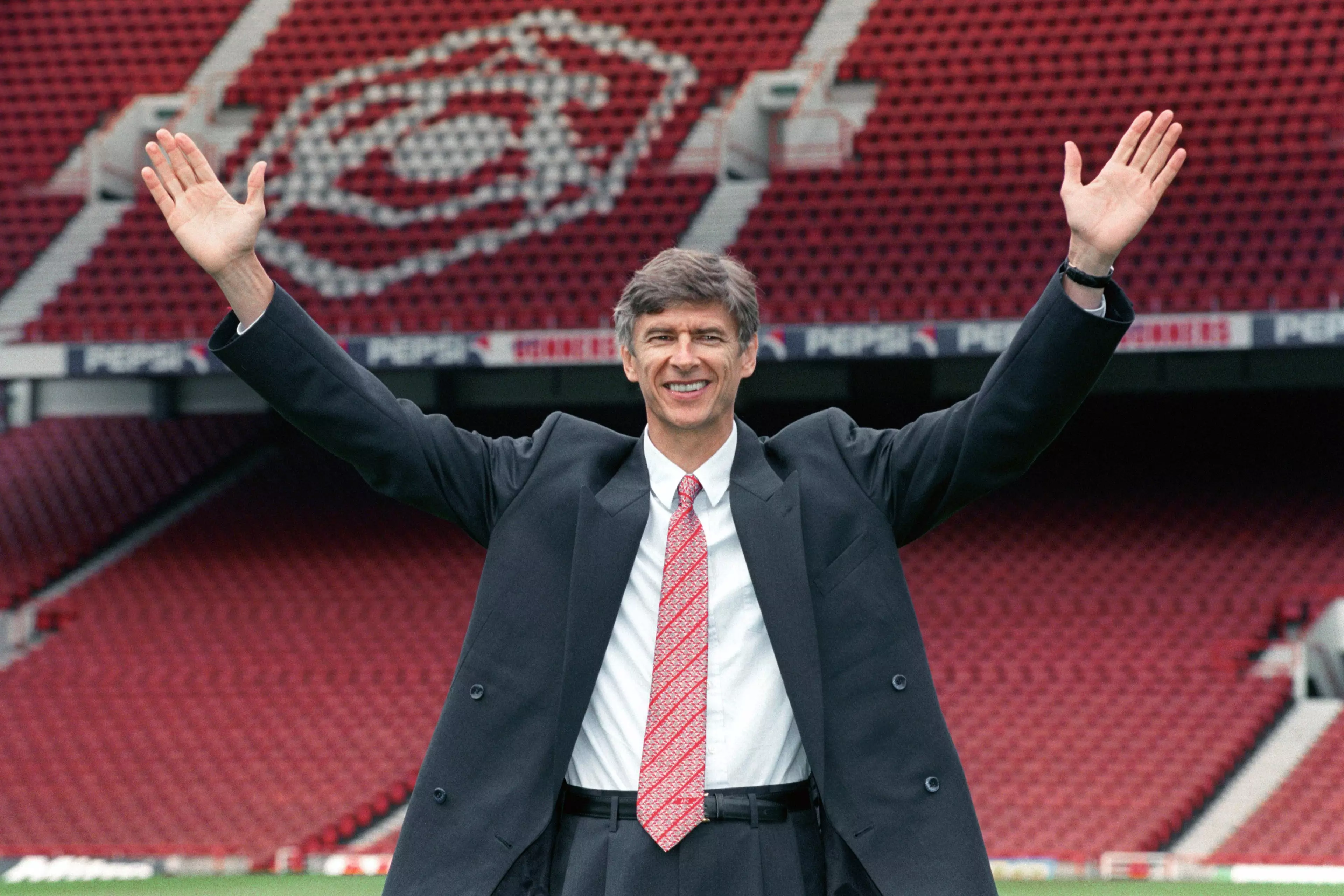 A young Wenger takes the job at Arsenal. Image: PA Images