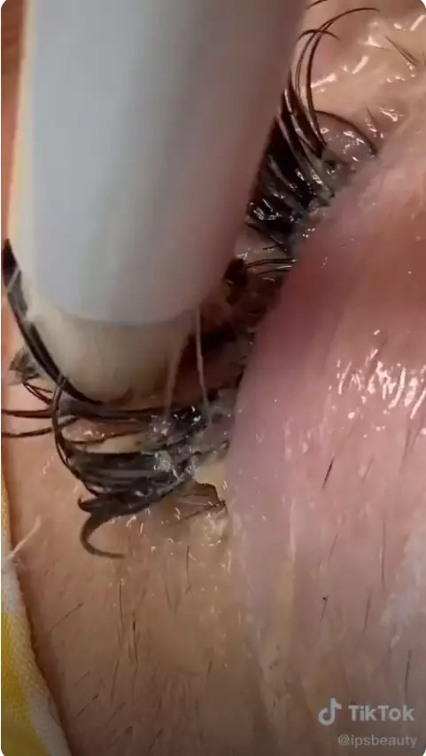 TikToker and beautician ipsbeauty attempts to clean her clients eyelashes (