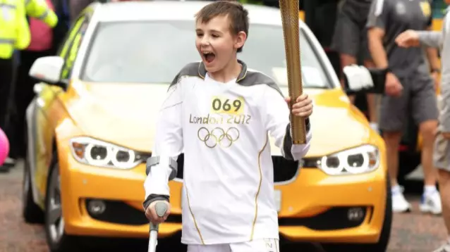 Brave Olympic Torch Carrier Who Fell Over But Carried On Has Died 