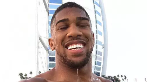 Anthony Joshua's Reply To Fan Who Said He'd Last 'At Least 9 Rounds With Him' Is Priceless 