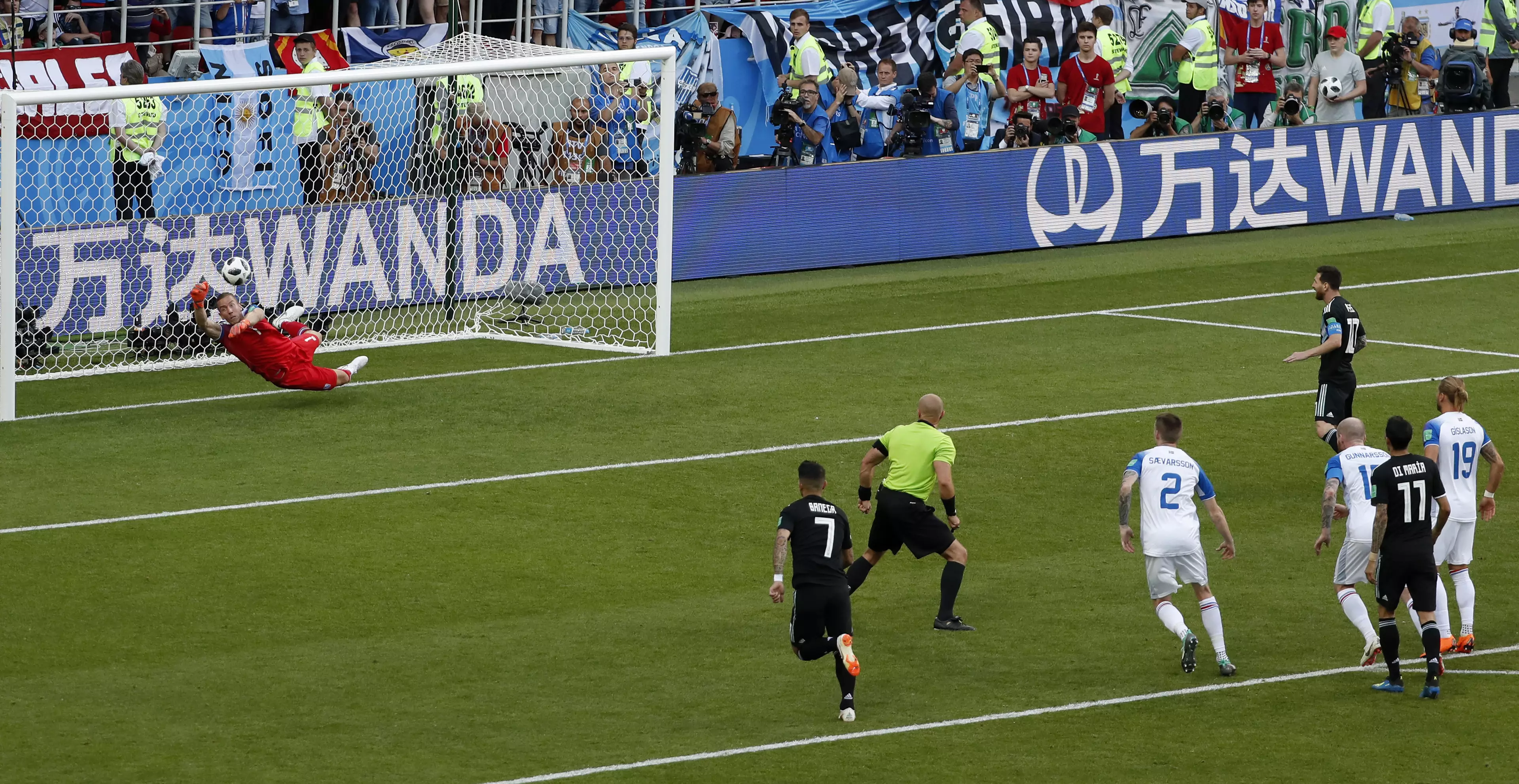 Halldorsson saves Messi's penalty. Image: PA