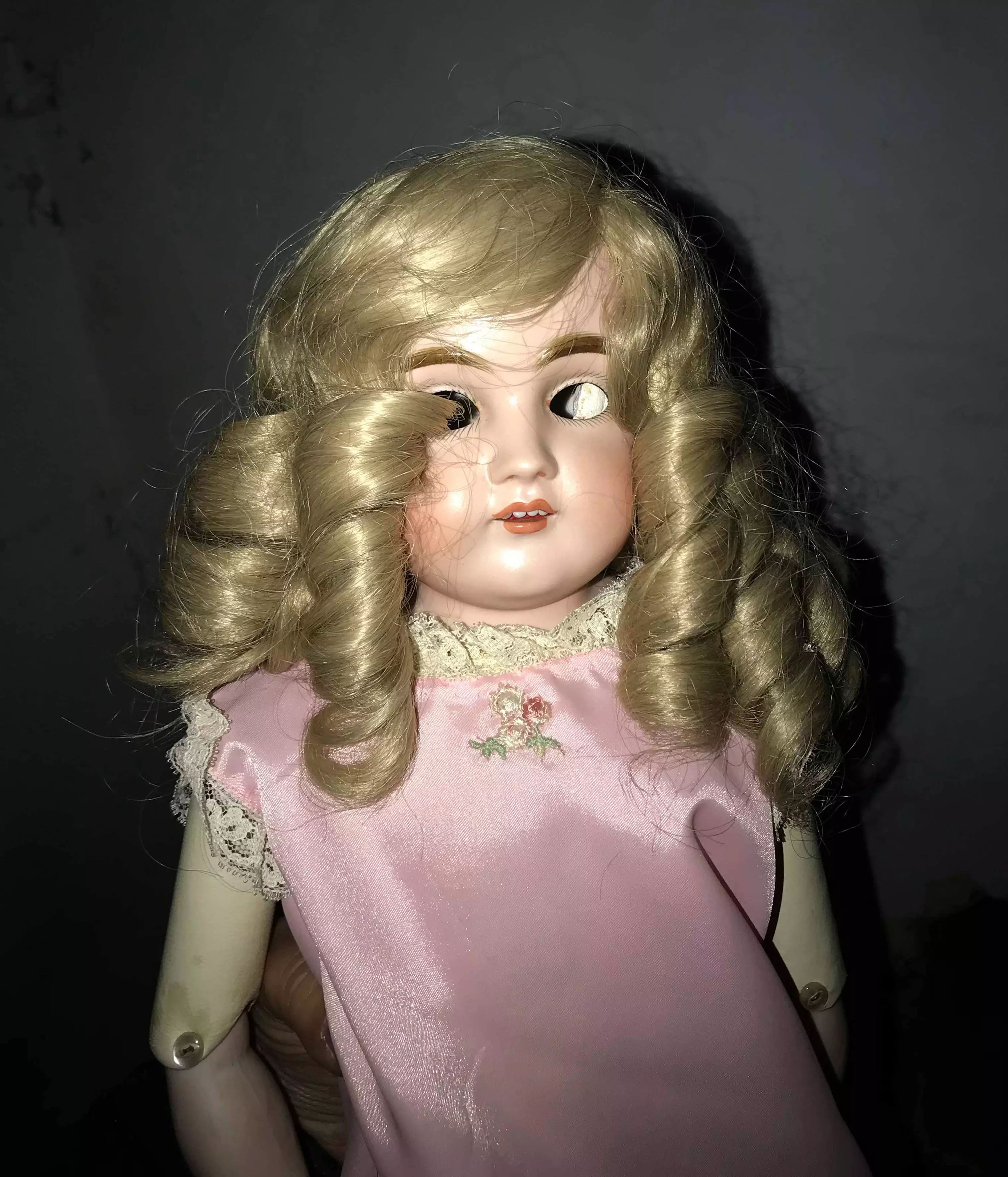 The doll doesn't have eyes or eyelids.