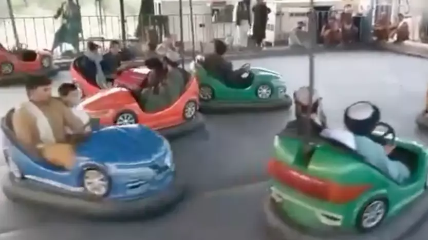 Bizarre Footage Shows Armed Taliban Soldiers Riding Bumper Cars In Kabul Amusement Park