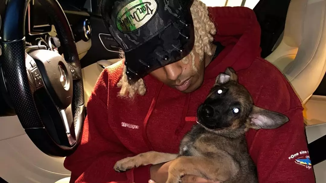 Rapper Adopts Dog After It Was Thrown At Him During Racist Incident