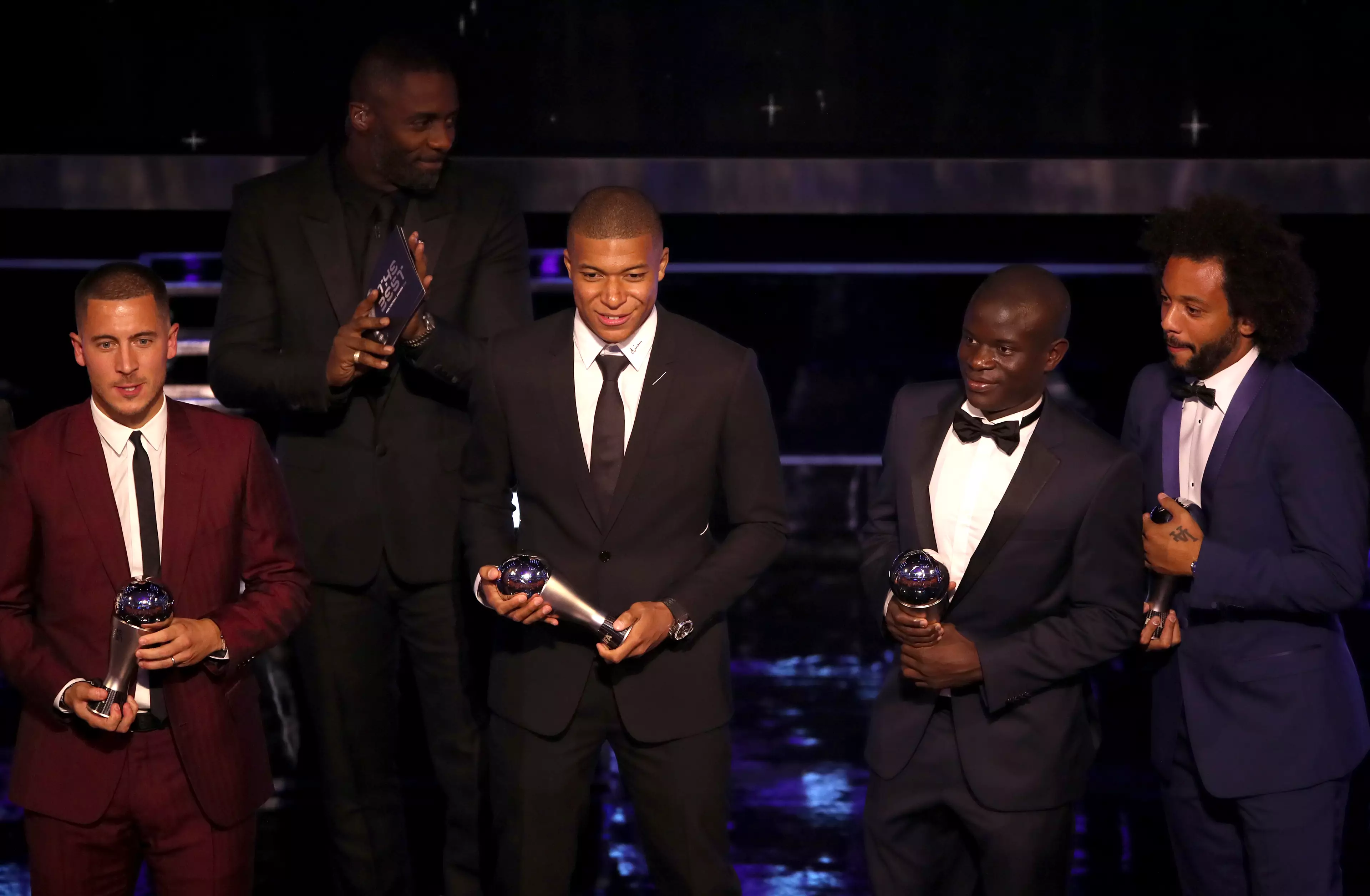 Hazard picks up his award alongside the rest of the team. Image: PA Images