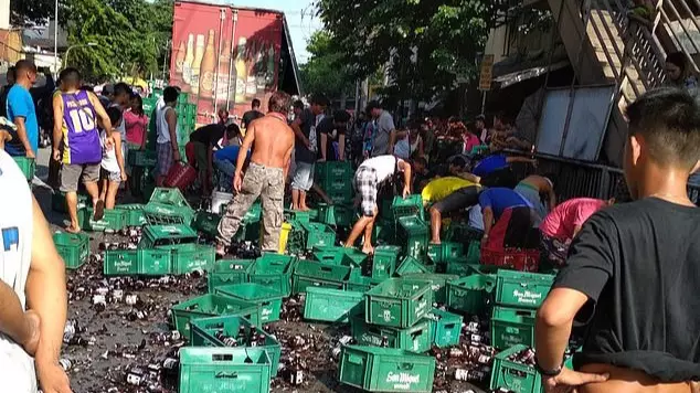 Locals Band Together To Help Clean Up Beer Bottle Disaster In Philippines