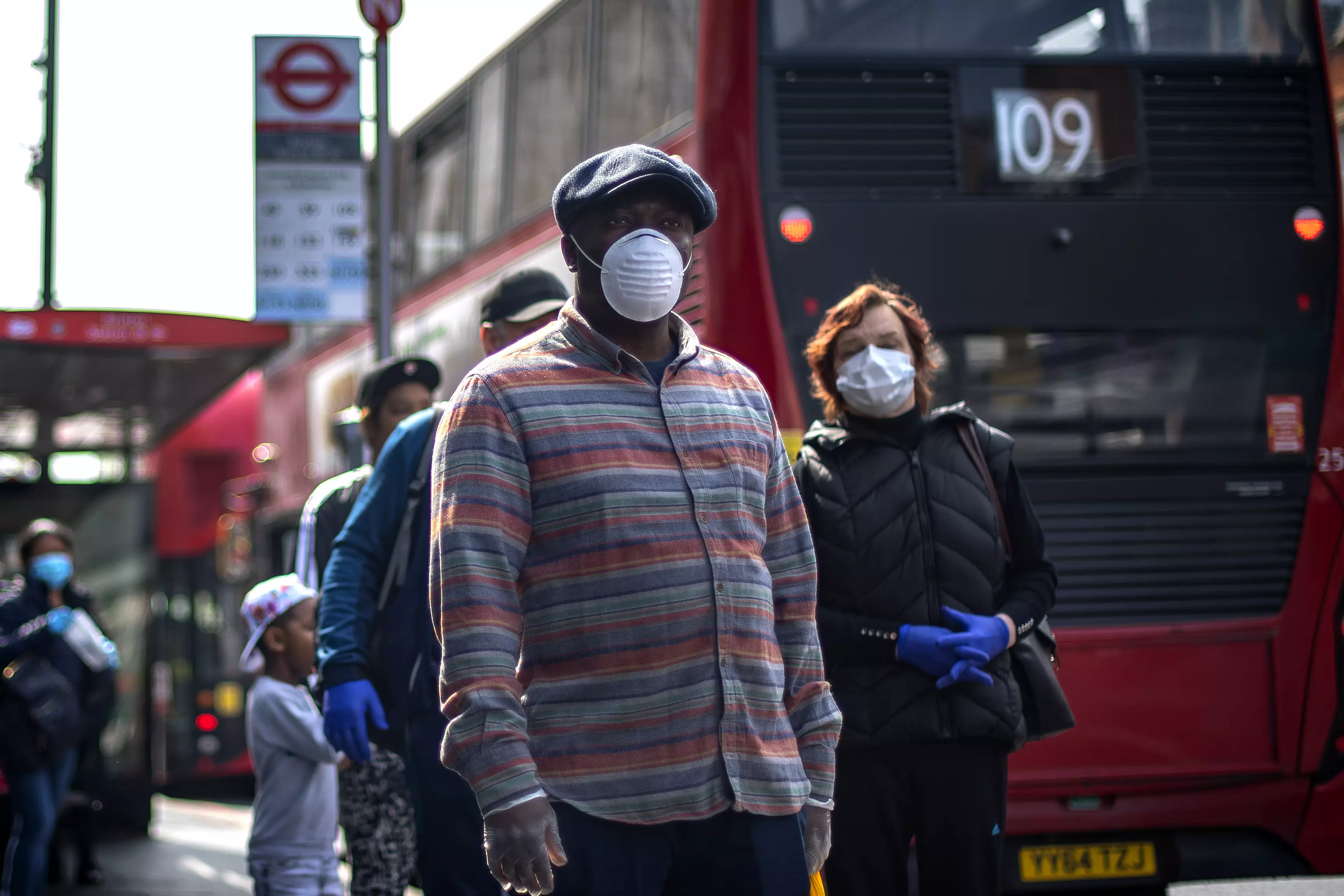 People wearing face masks in London.