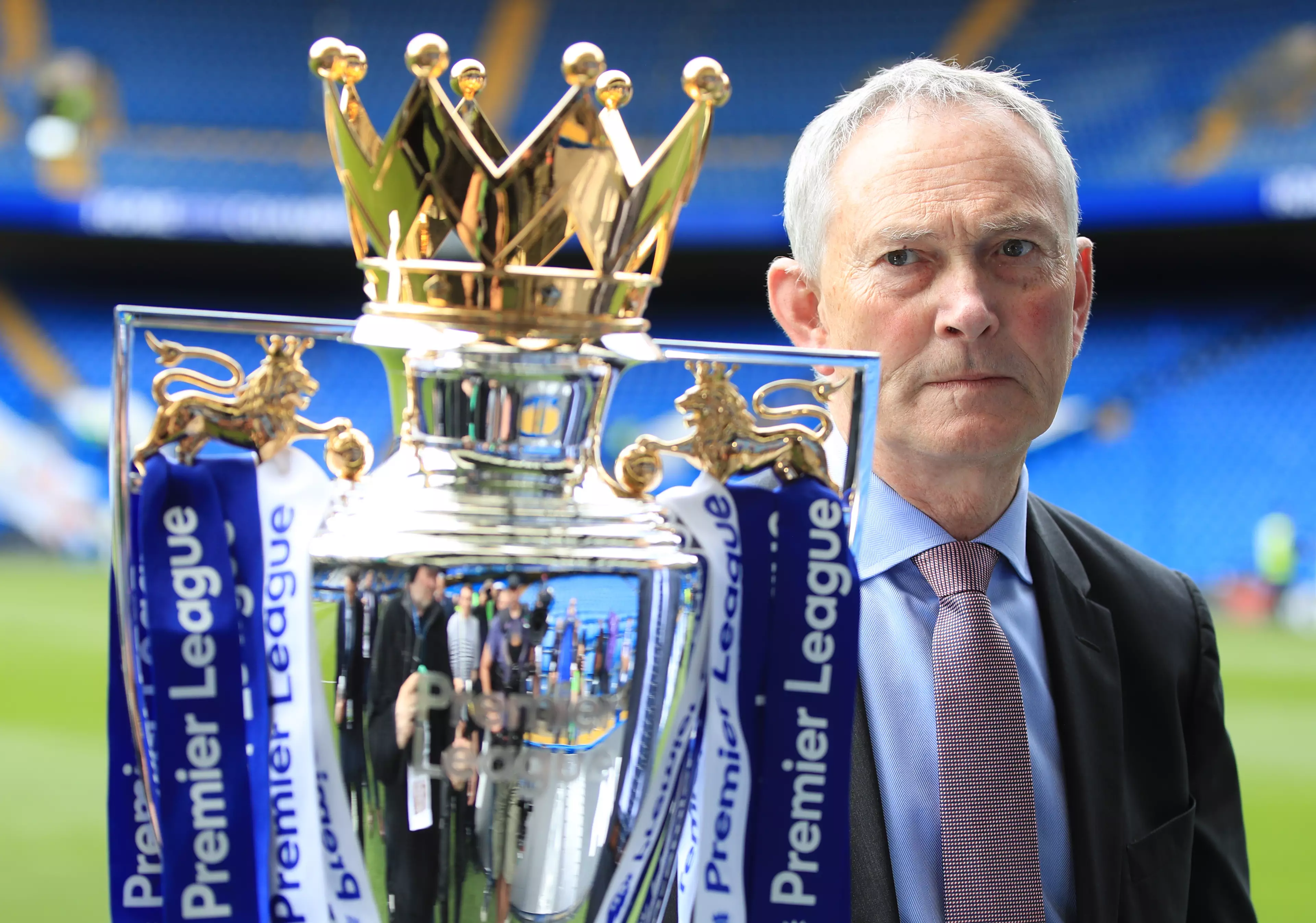 Scudamore with the Premier League trophy. Image: PA Images