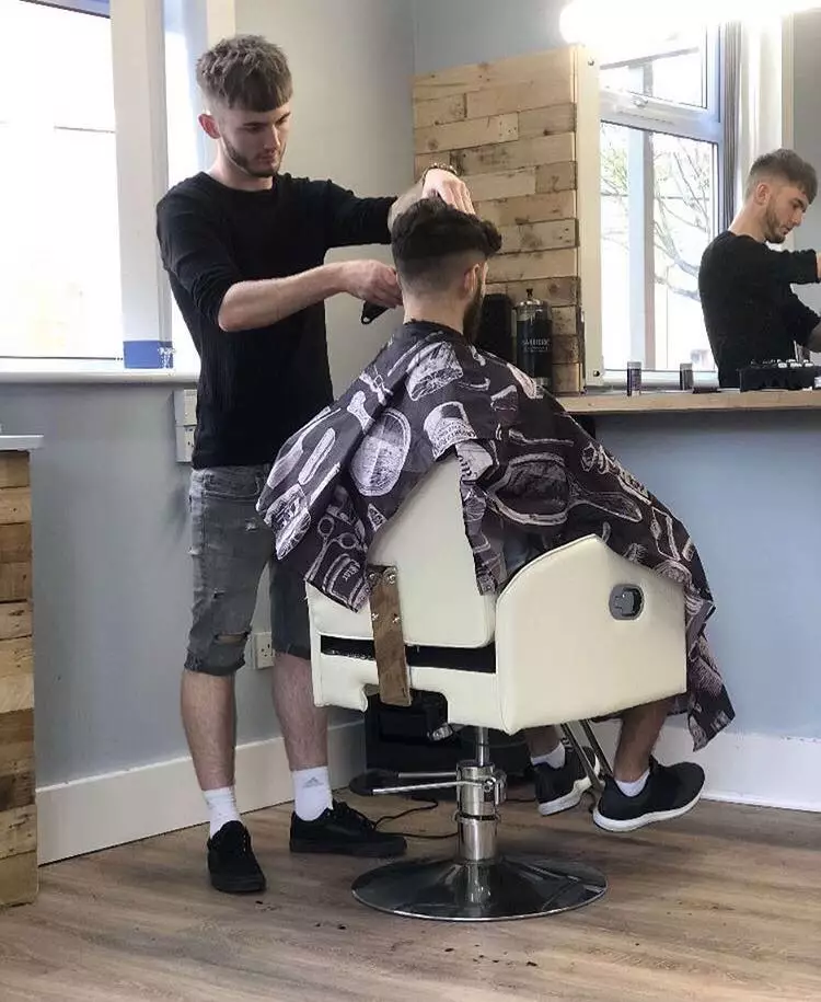 CSF Barbering owner Connor Storer-Fry and one of his customers. Image: CSF Barbering