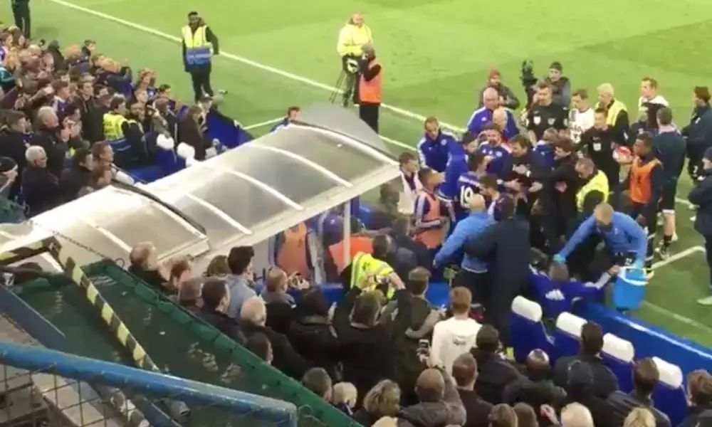WATCH: Chelsea Boss Guus Hiddink Gets Knocked Over In Post Match Scramble