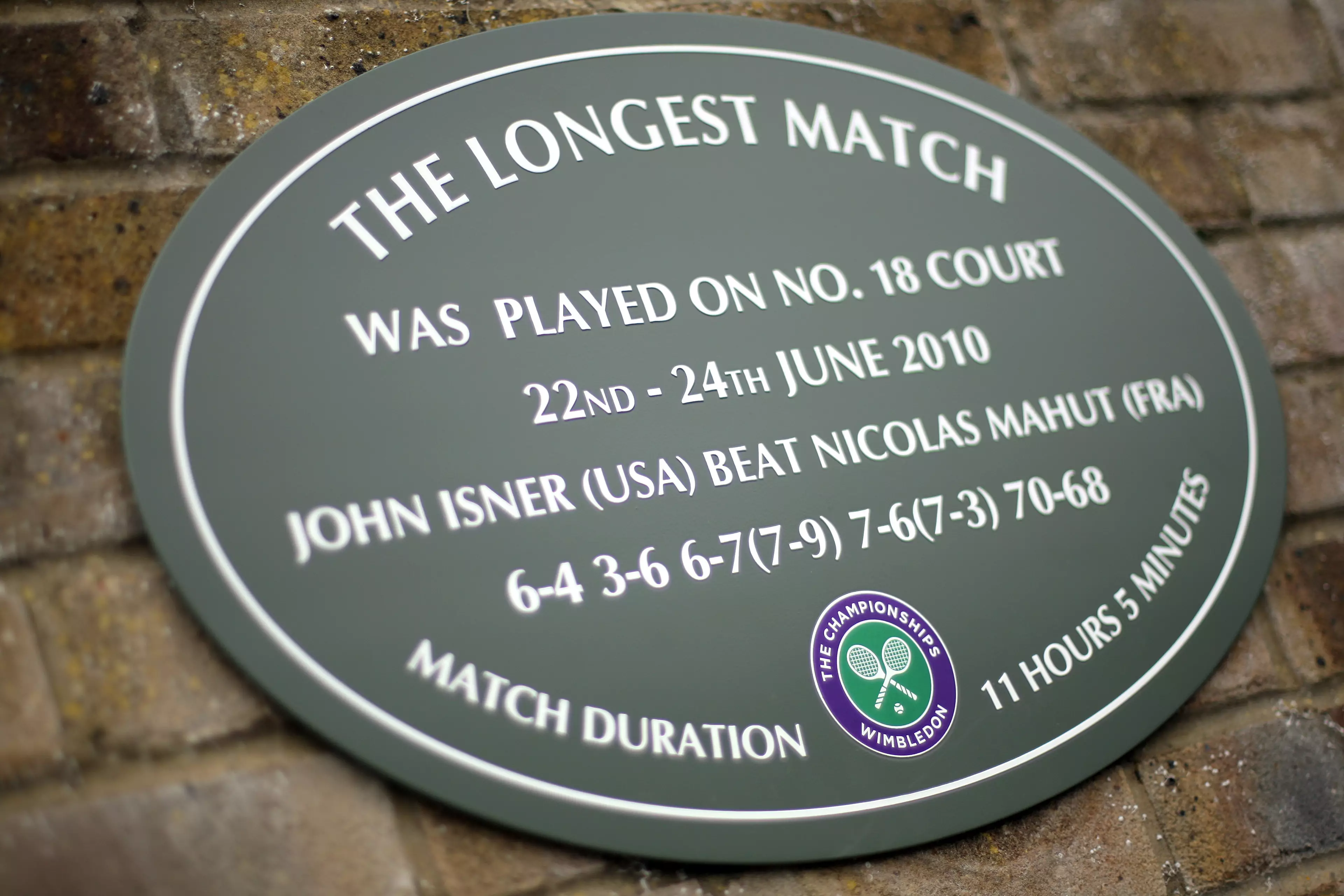 A plaque on Court 18 commemorates the incredible match. Image: PA Images