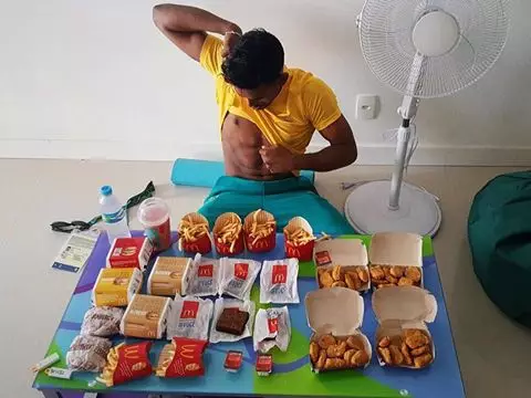 Olympian Celebrates By Ordering His Bodyweight In Junk Food (Probably)