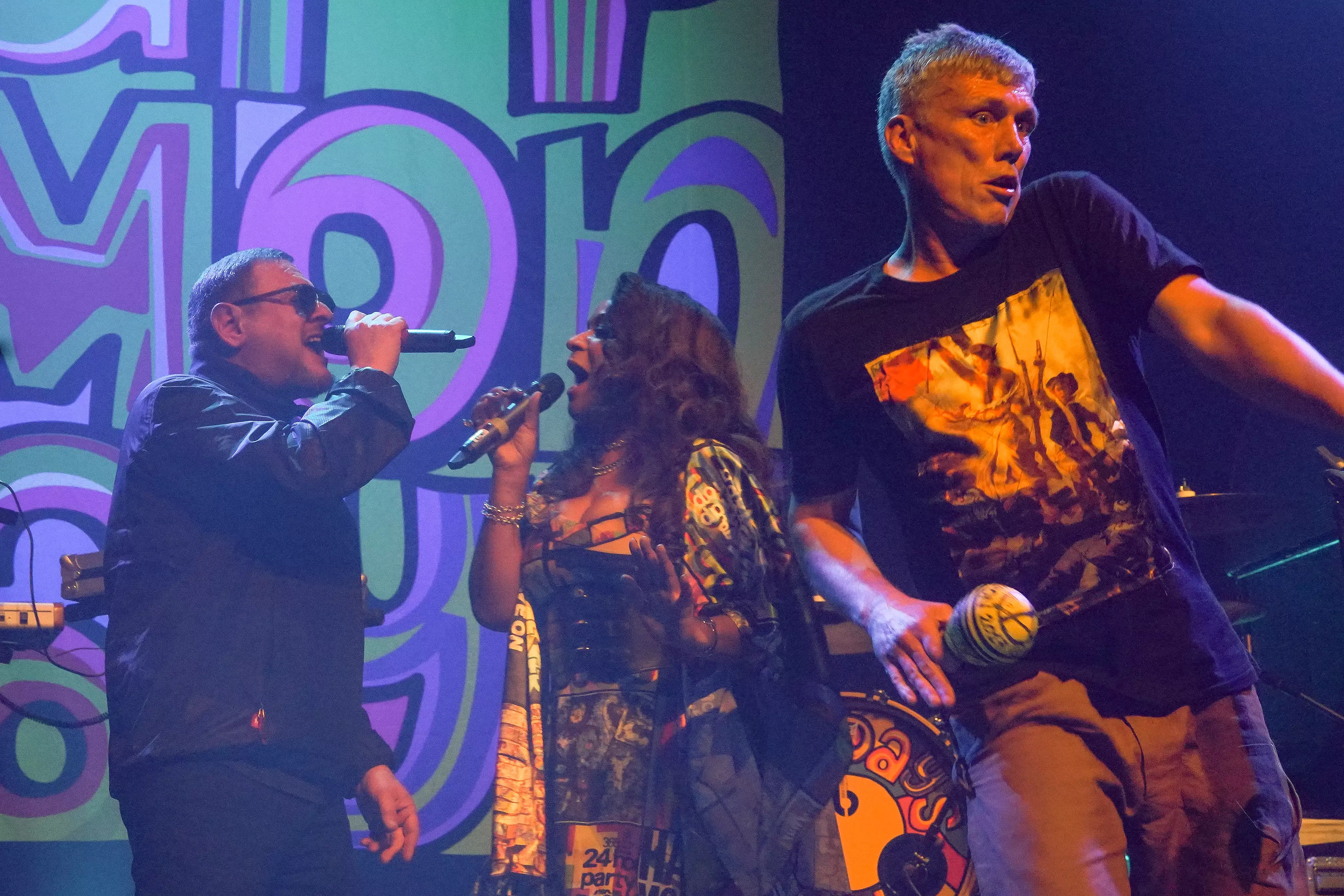 Shaun Ryder (left) performing with The Happy Mondays.