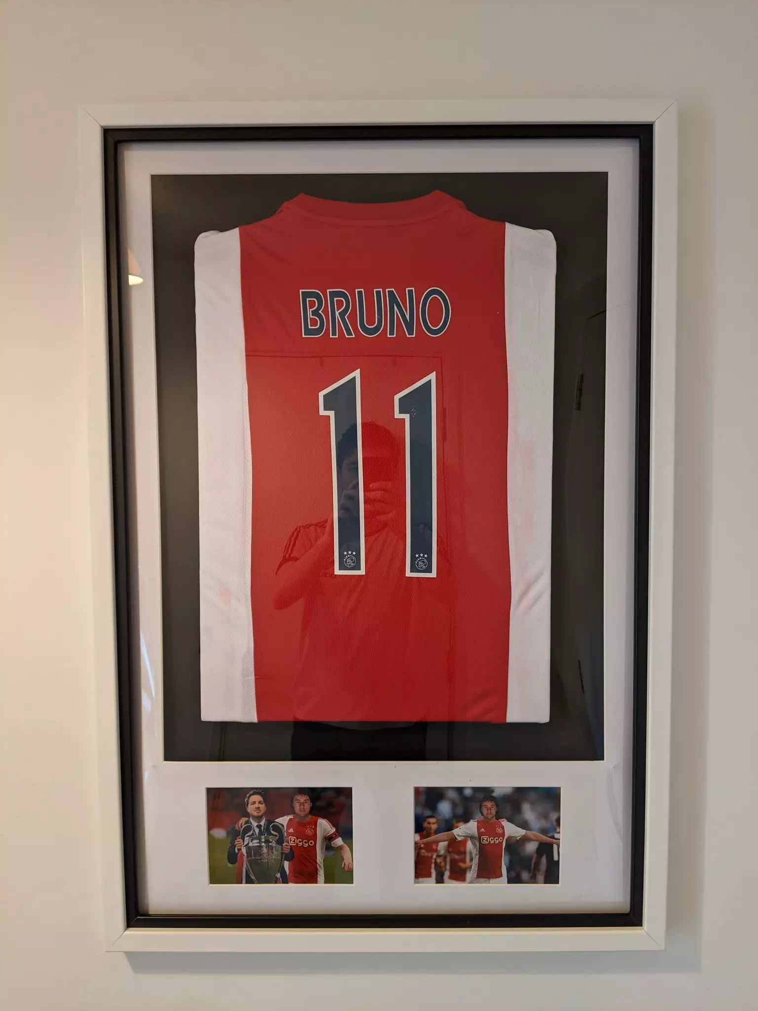 Bruno's number 11 shirt has pride of place in Tom and Natalie's living room and has done so for a number of years.