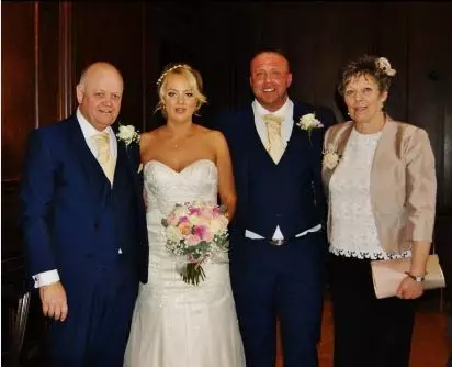 Ben with wife Emma and his family.