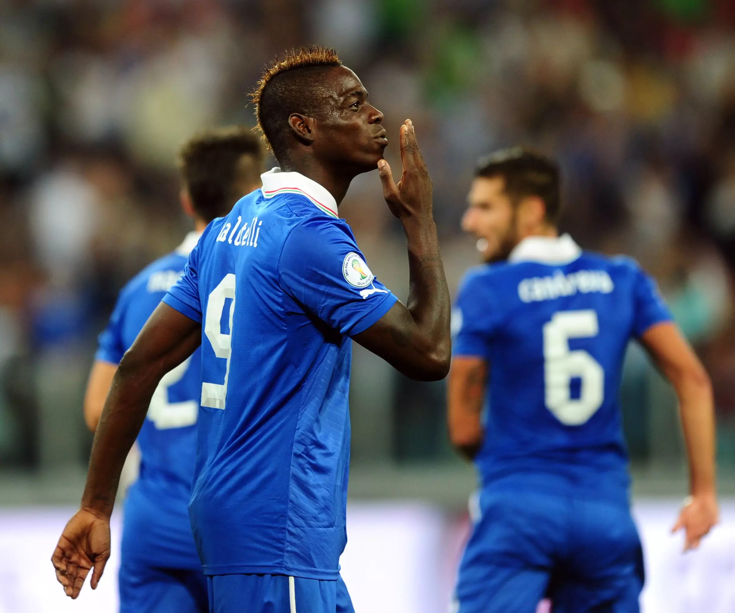Balotelli celebrates scoring a goal for Italy. Image: PA