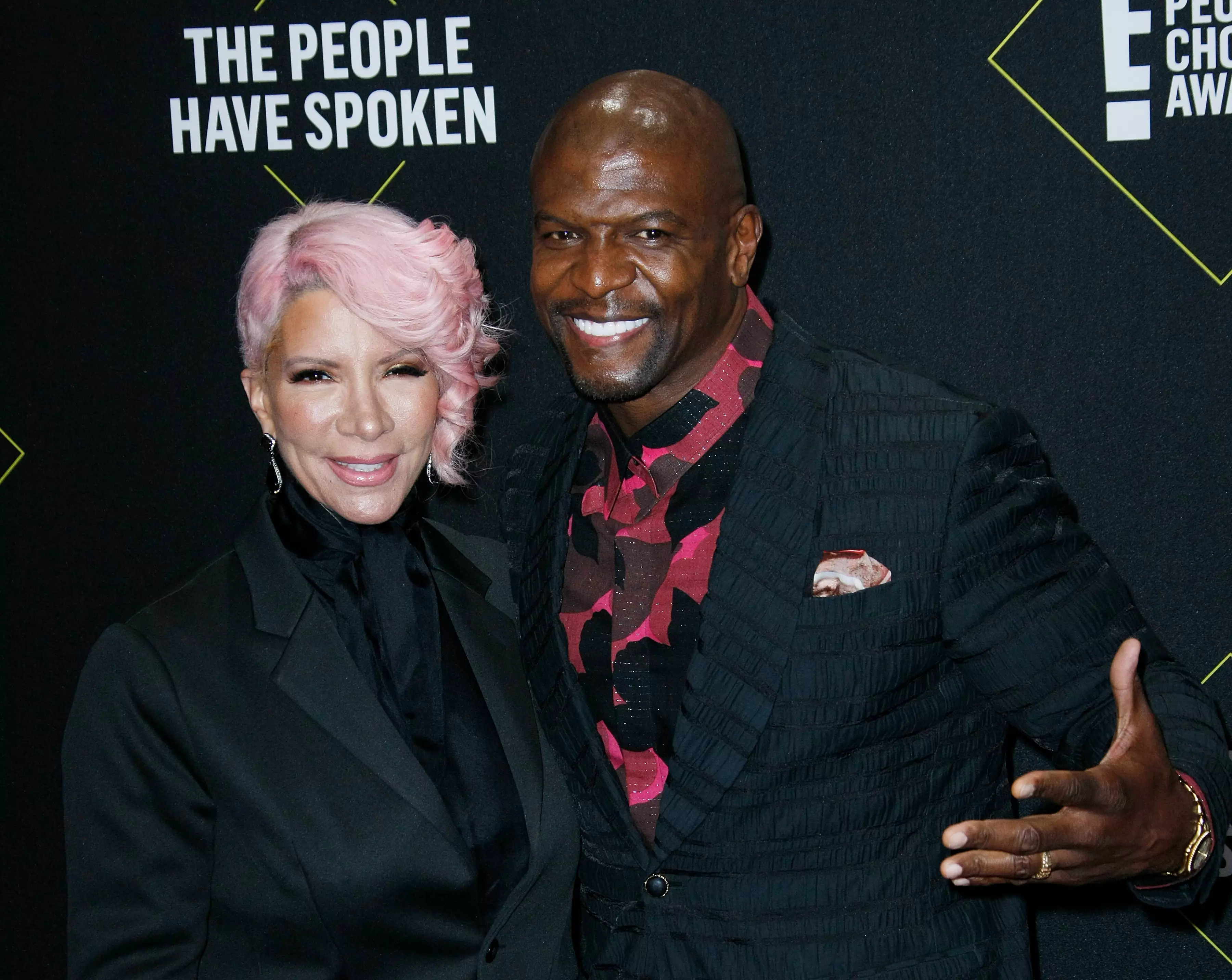 Terry Crews has revealed his wife Rebecca is '100 percent cancer free'.
