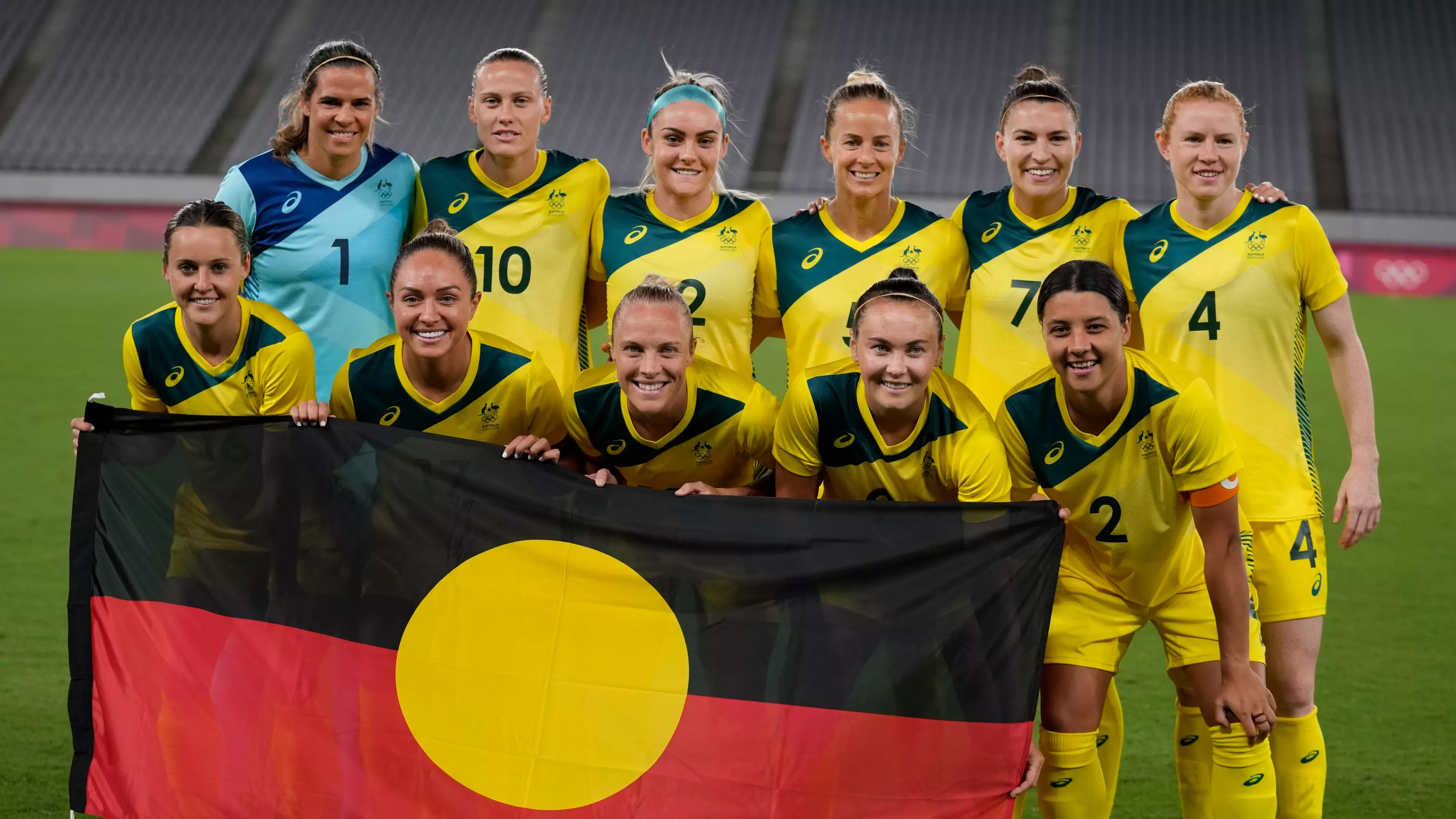 Matildas Hold Aboriginal Flag For Team Photo Before First Olympic Games Match