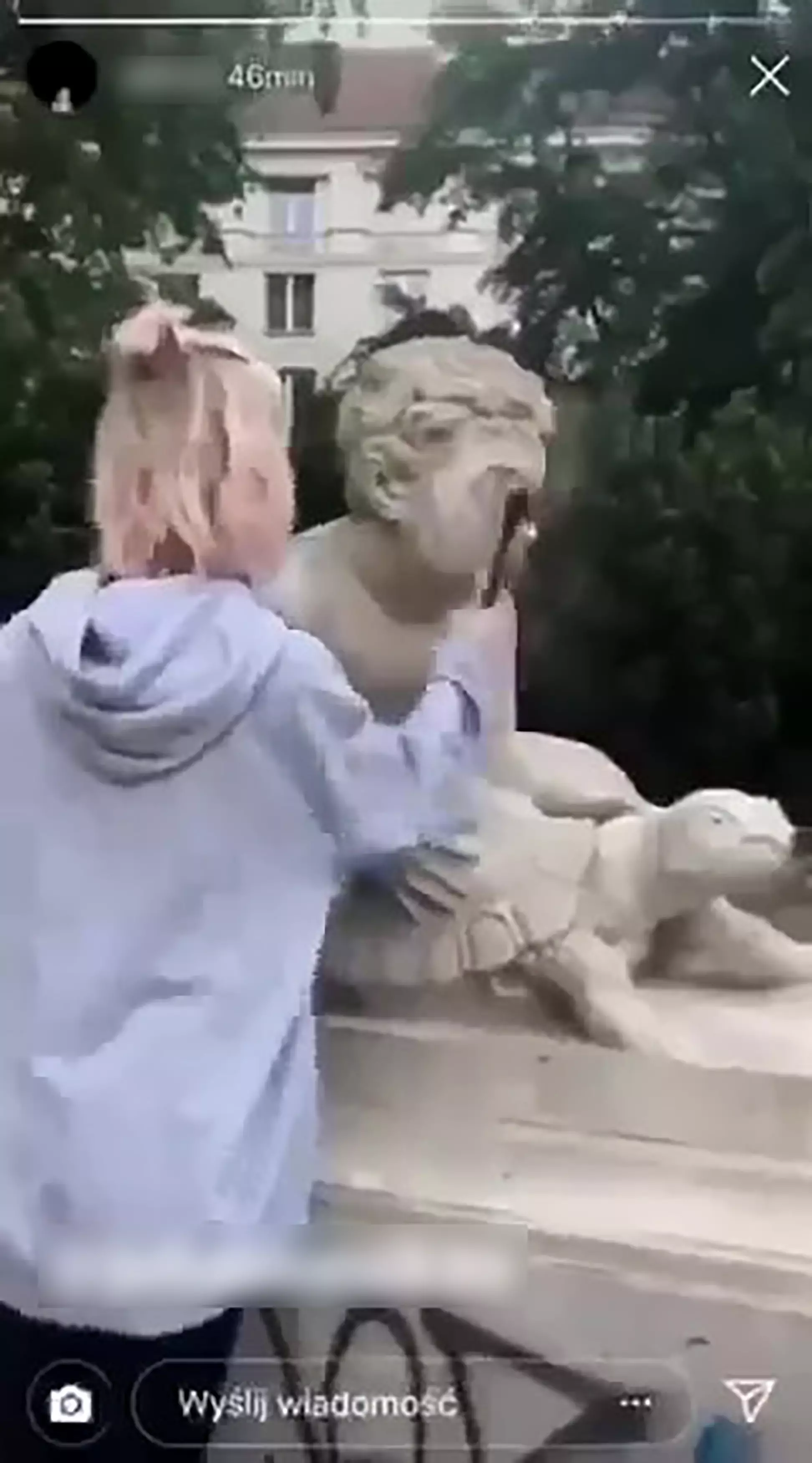 The Instagram model used a hammer to smash the nose off the statue.