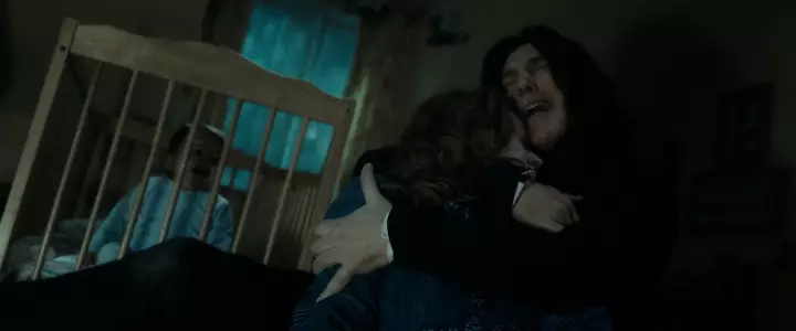 Snape tenderly cradles Lily's body after she is murdered (