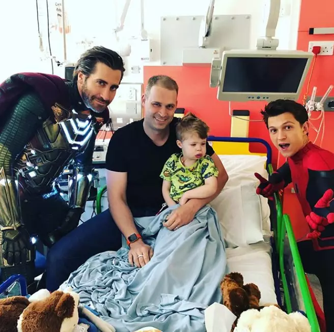Jake Gyllenhaal and Tom Holland visited sick children on Friday.