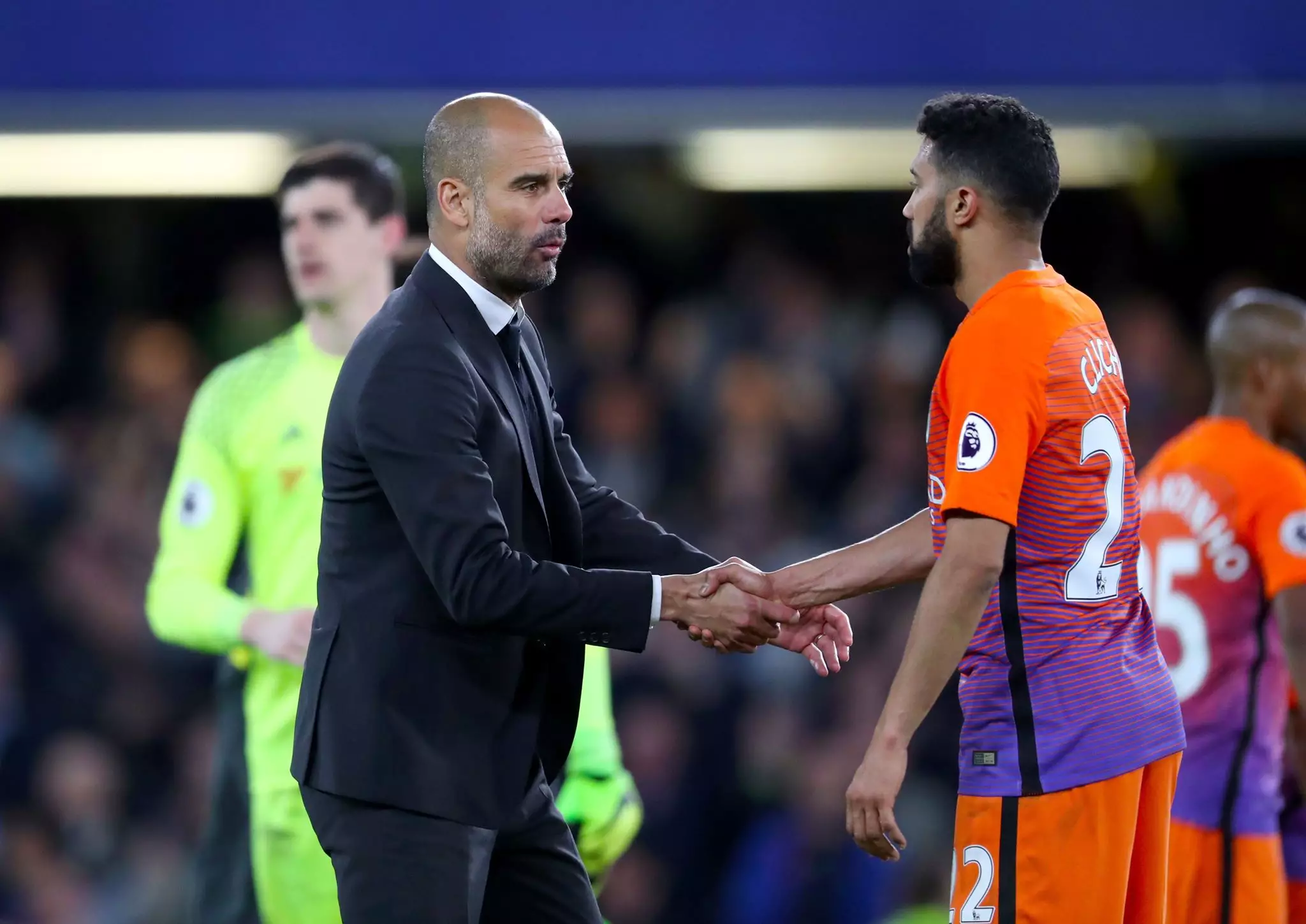 Guardiola shakes hands with Clichy. Image: PA