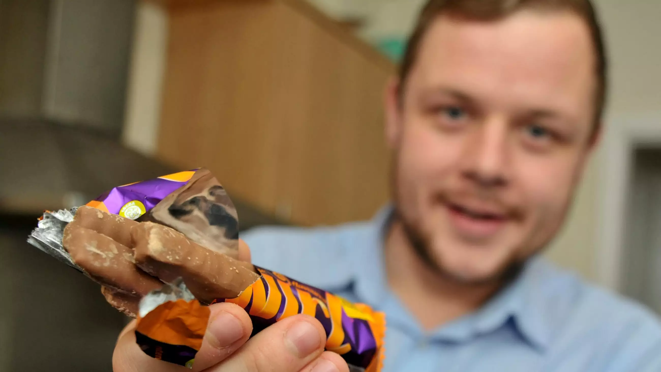 Man Opens Up Cadbury Orange Twirl To Find Three Fingers Of Chocolate 