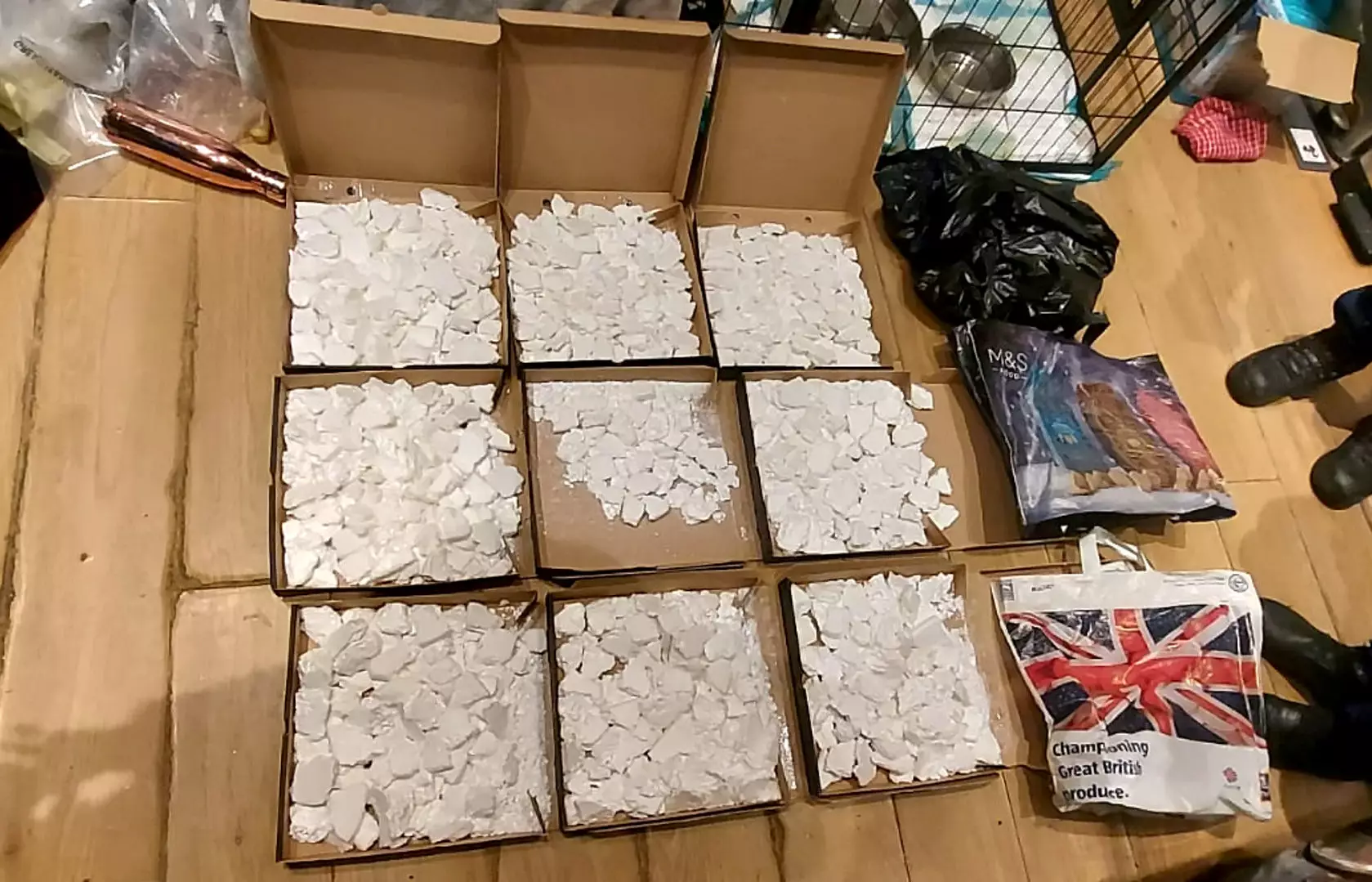 Police seized nine pizza boxed filled with what appears to be cocaine.