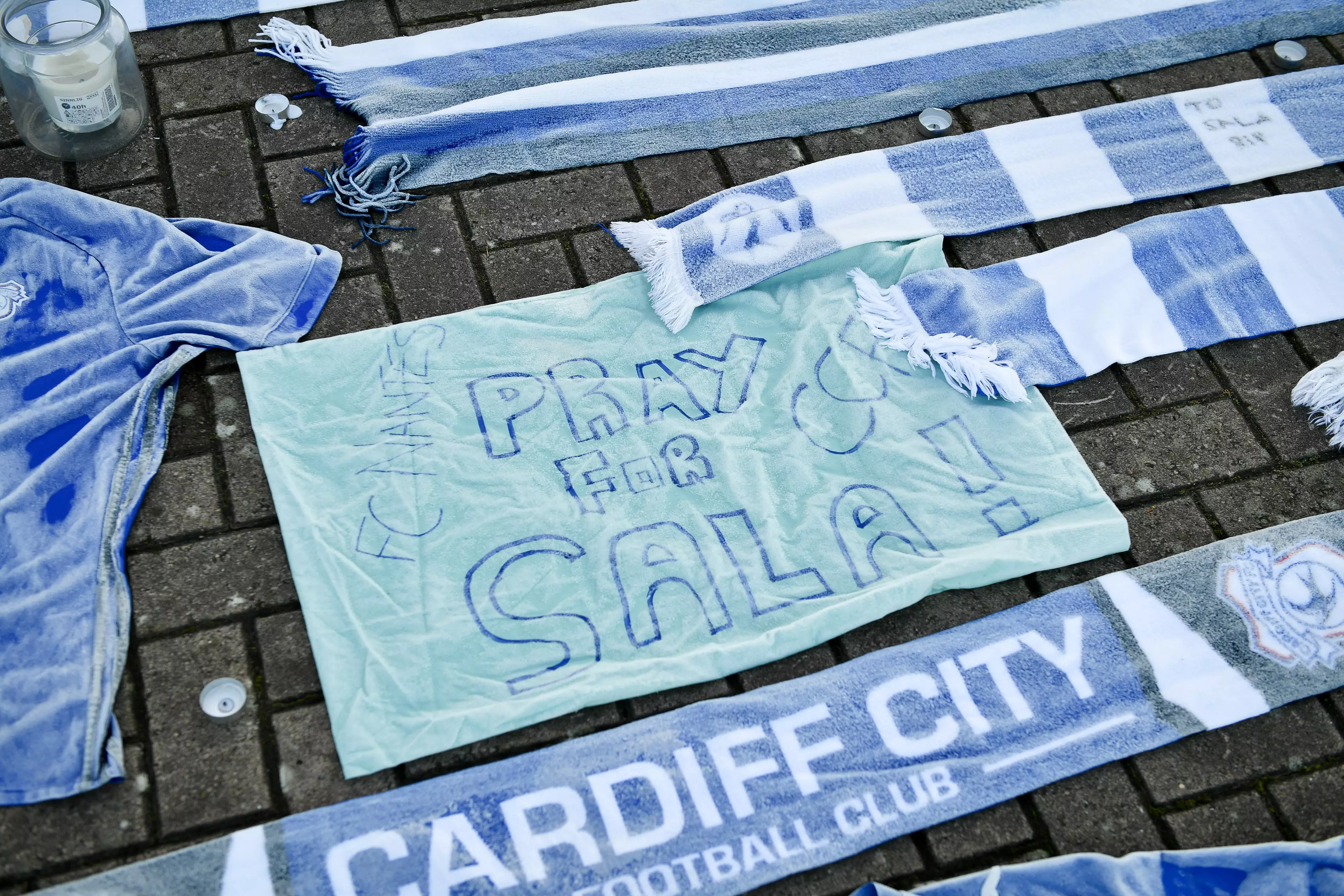 Tributes left outside Cardiff City. Image: PA