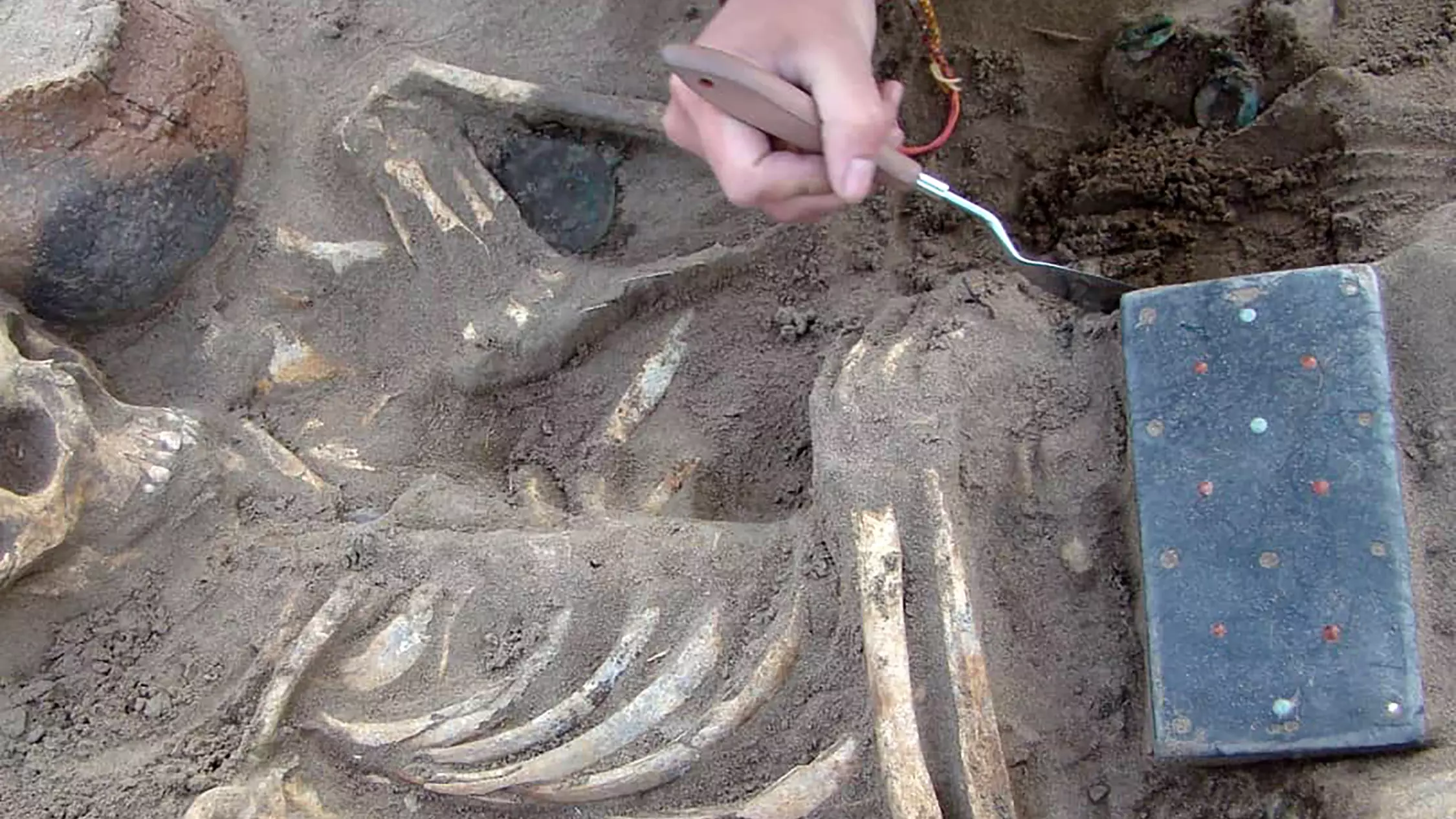 Archeologists Find 2,100-Year-Old 'iPhone' In Grave In 'Russian Atlantis'