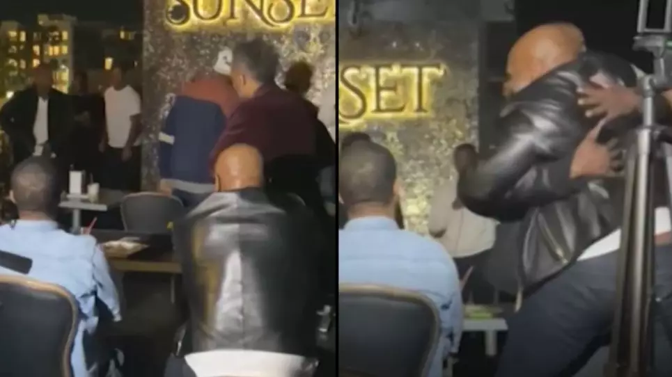 Mike Tyson Doesn't Flinch When Man Pulls Gun In Bar