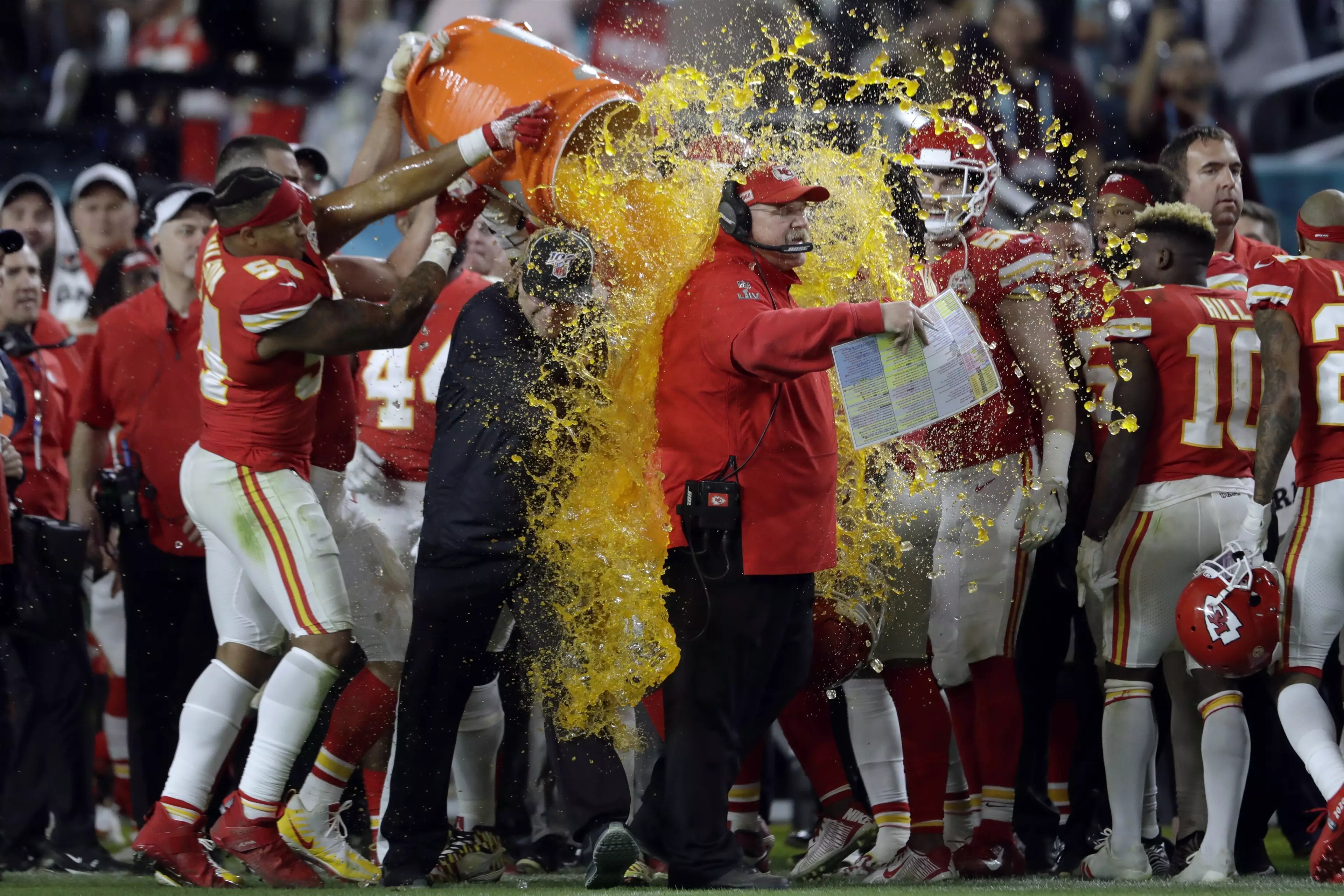 Chiefs head coach Andy Reid is covered in Gatorade by his players