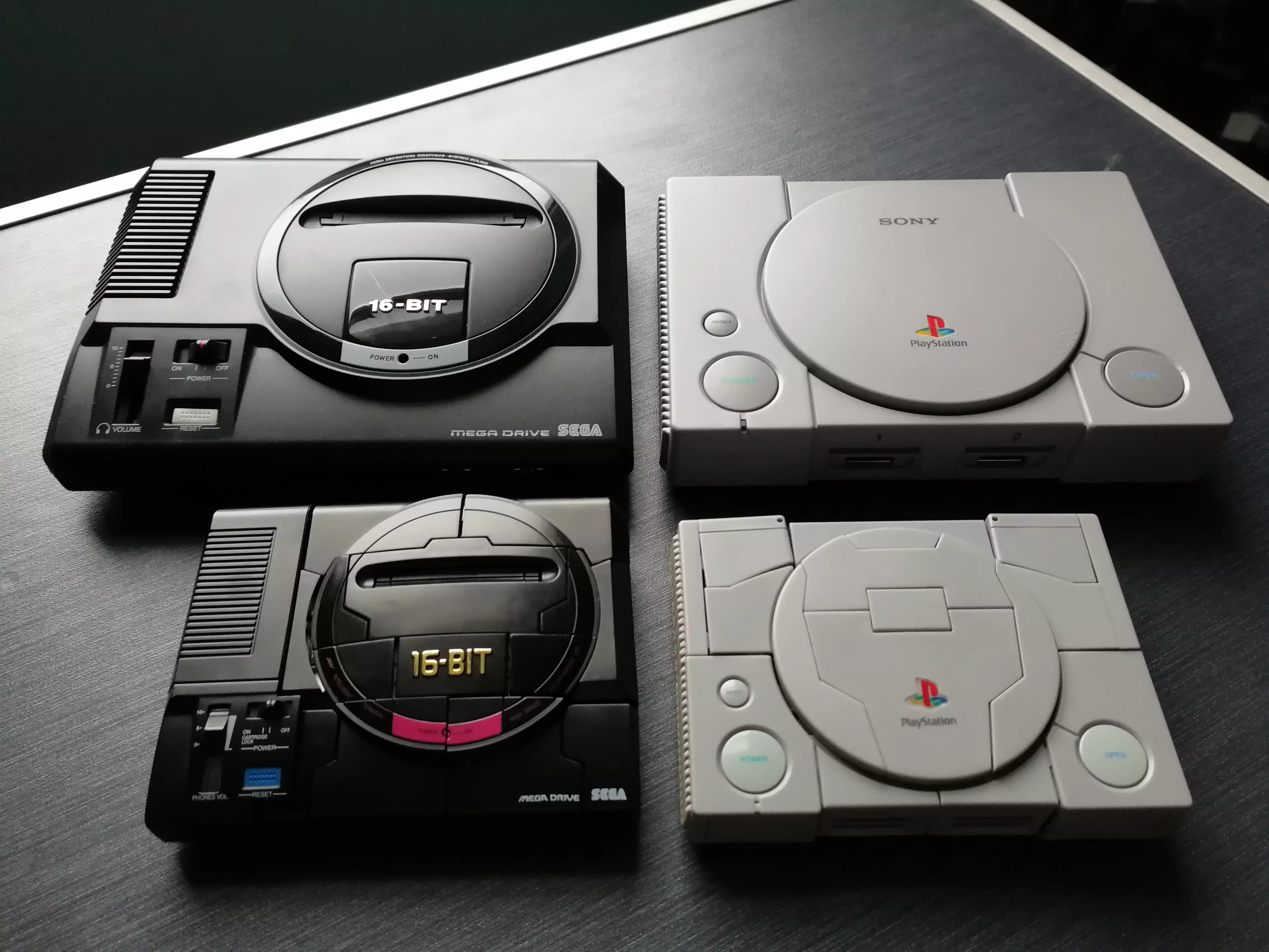 Console Transformers beside the mini versions of the original systems