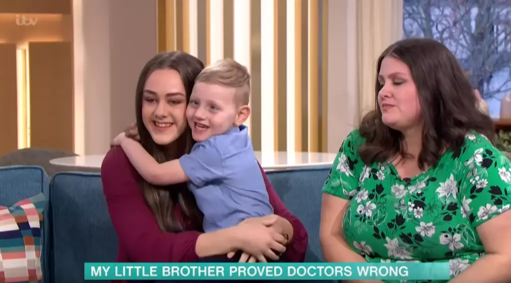 Christian's big sister Jade and foster mum couldn't hold back the tears (