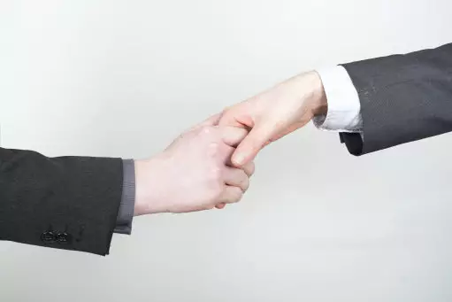 Handshakes could be banned in the workplace.