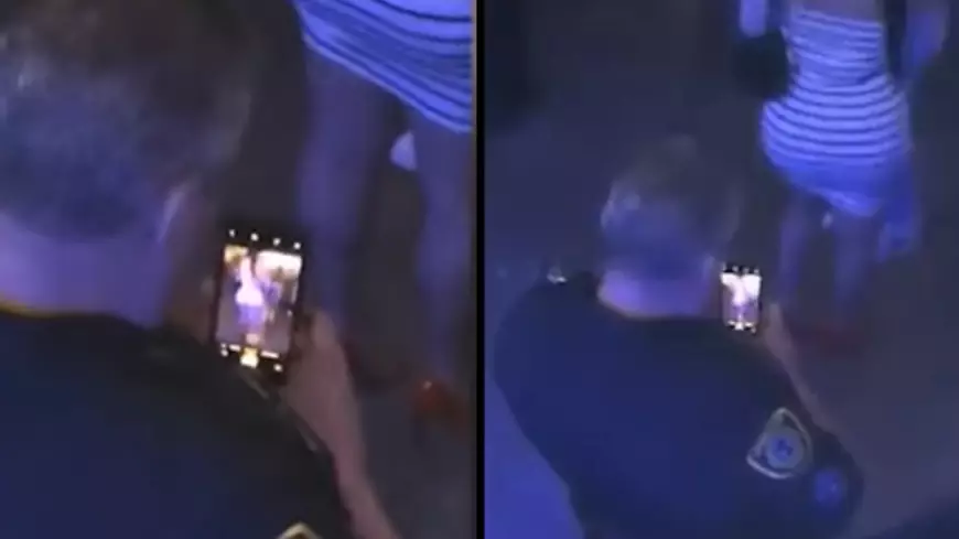 Police Officer Caught Secretly Taking A Photo Of A Woman's Bum At Drake Concert