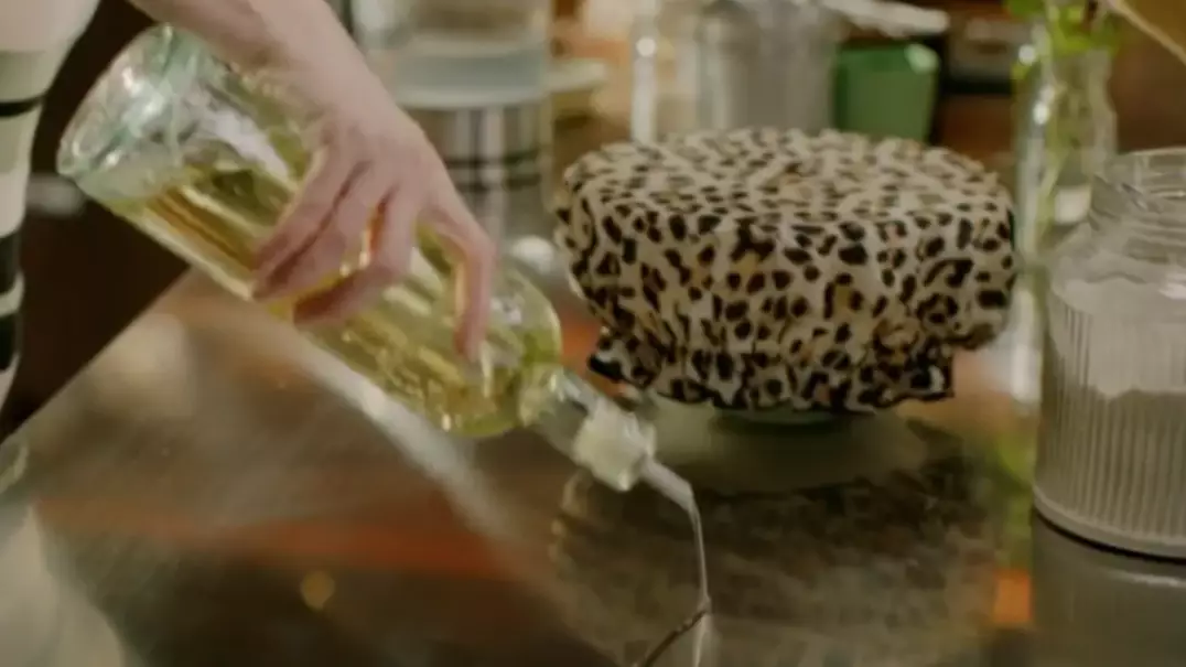 People Are Losing Their Minds That Nigella Lawson Uses A Leopard Print Shower Cap To Prove Her Dough