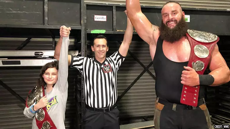 Braun with Nicholas and his dad. Image: WWE