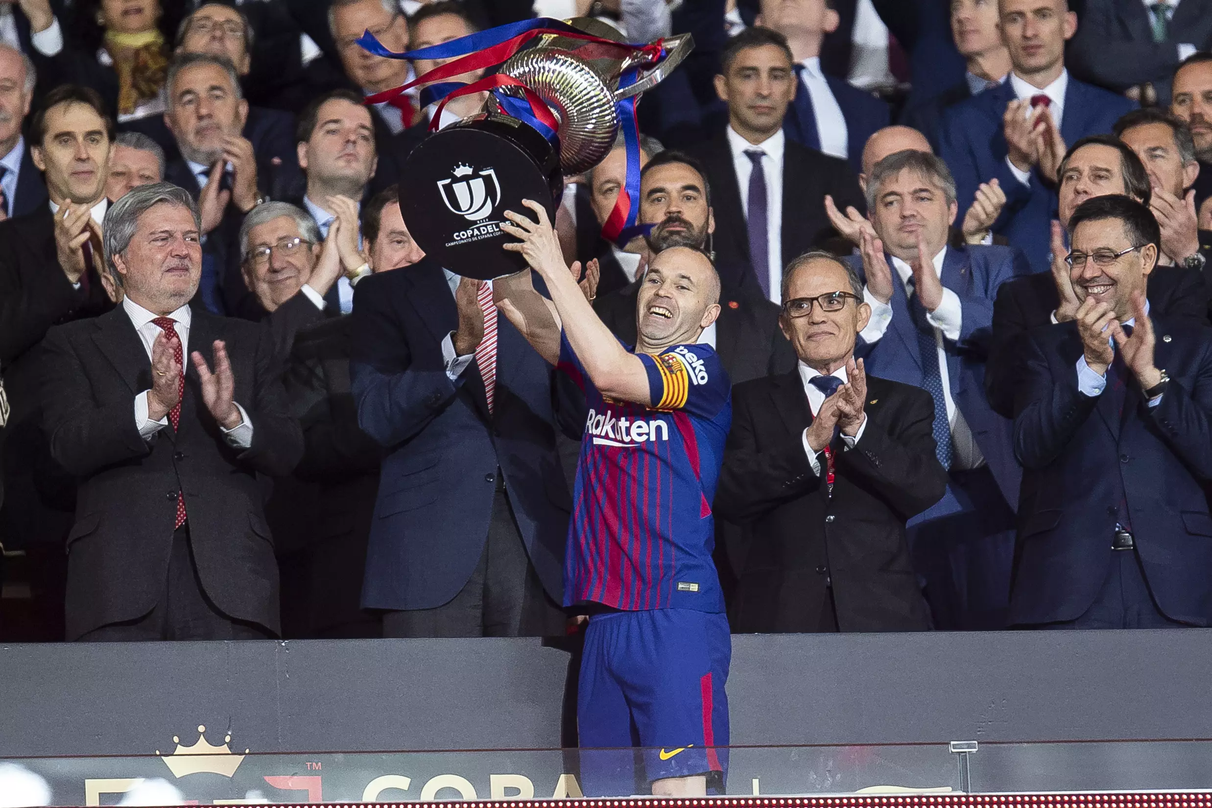 Iniesta holds aloft the Copa del Rey. Image: PA
