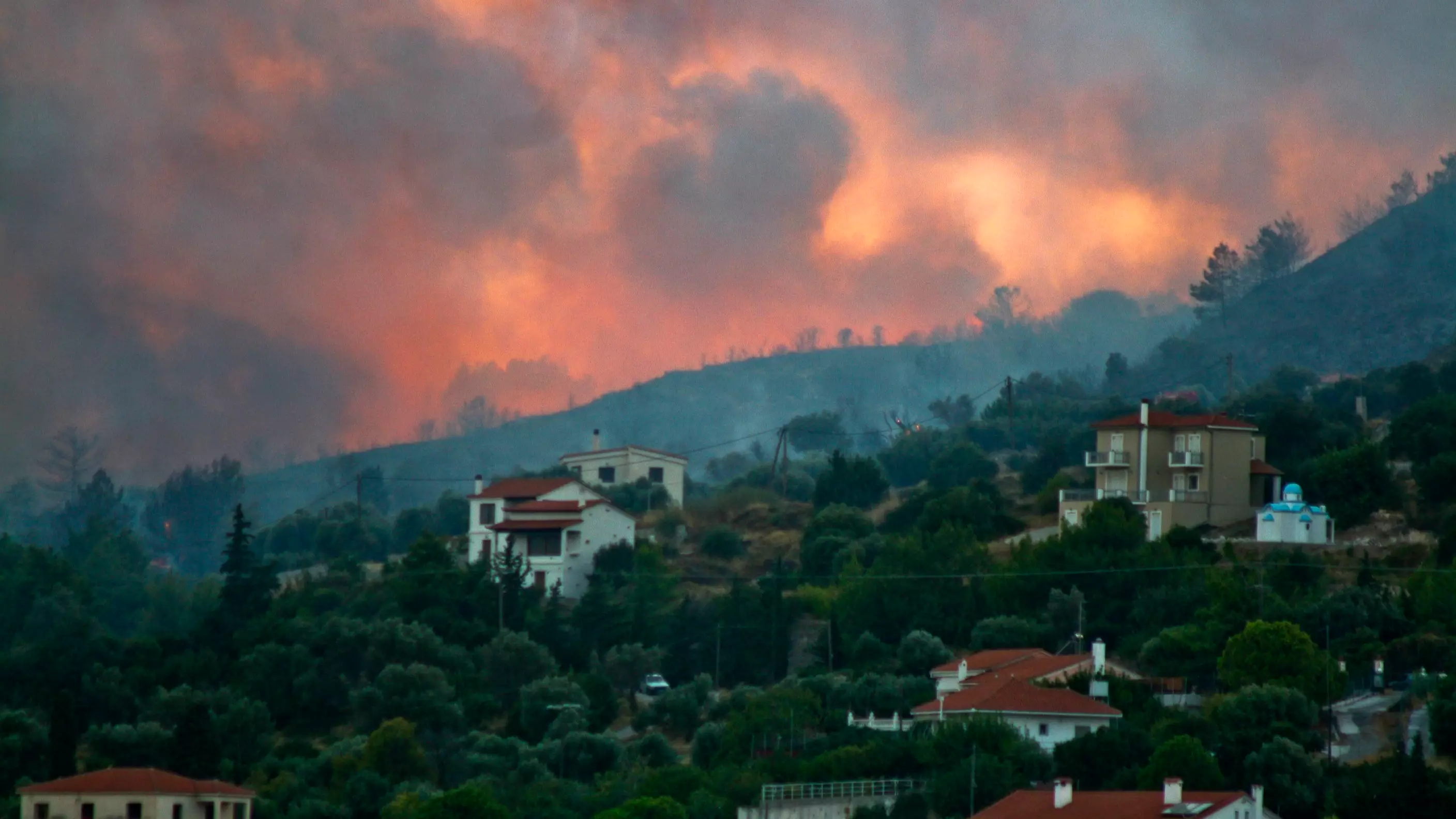 Hundreds Of Holidaymakers Evacuated After Wildfires Rage In Greece