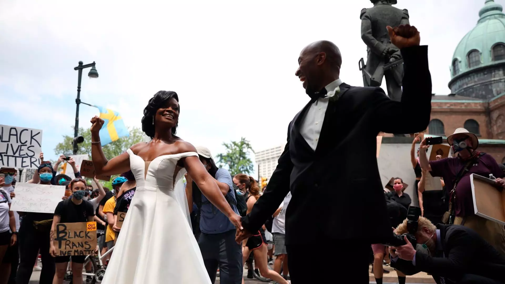Newly Wed Couple Joins Protests In Philadelphia 
