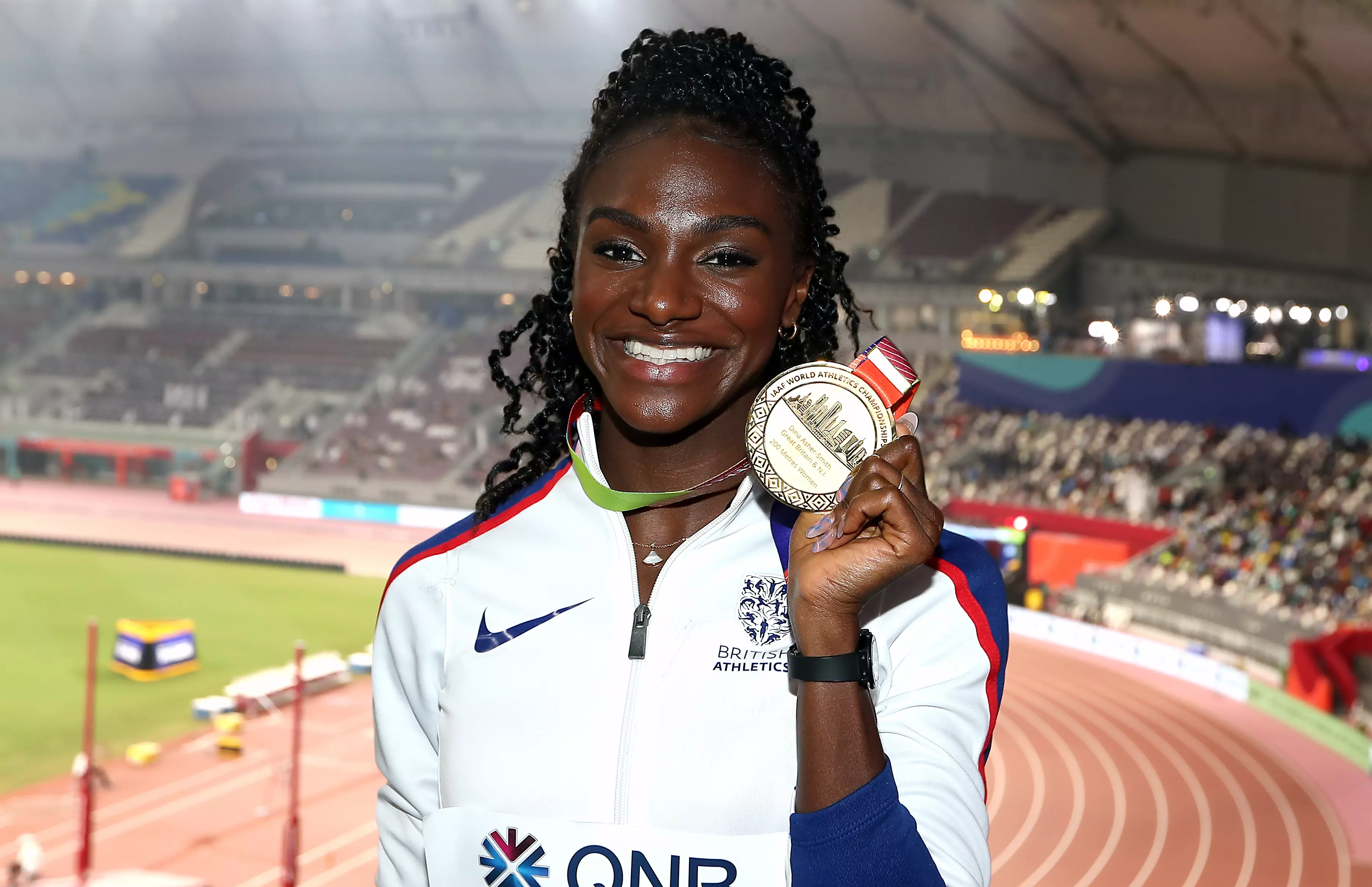 Dina Asher-Smith receives her gold medal for the Women's 200m Final during day seven of the IAAF World Championships in Doha, 2019. (