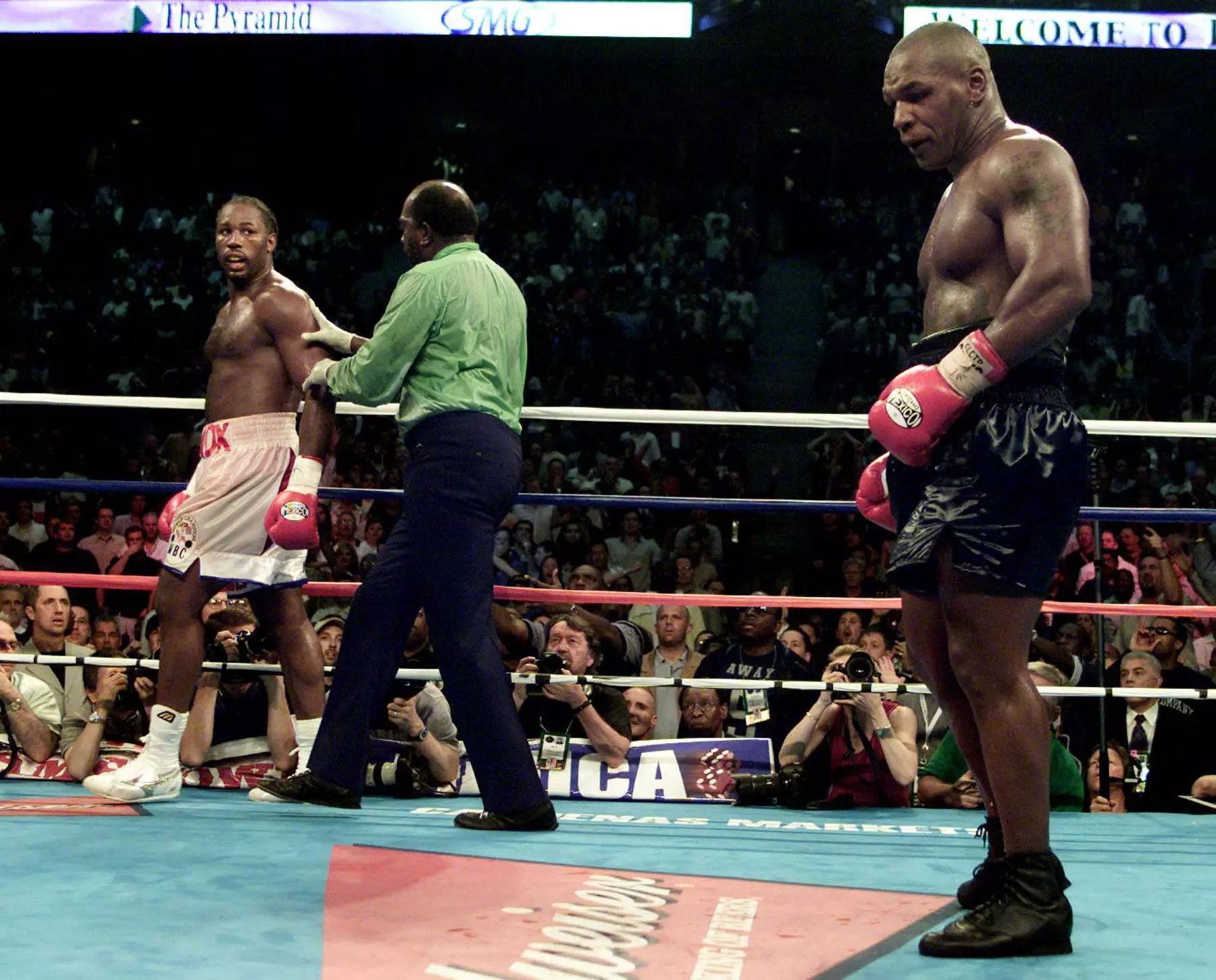 Lewis and Tyson during their fight. Image: PA Images