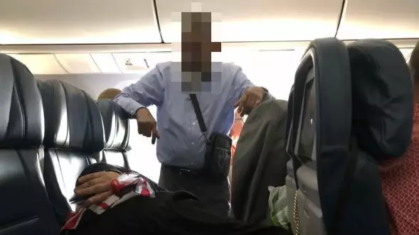 Twitter Is Shook After Man Stands On Flight For Six Hours So Wife Can Lie Down