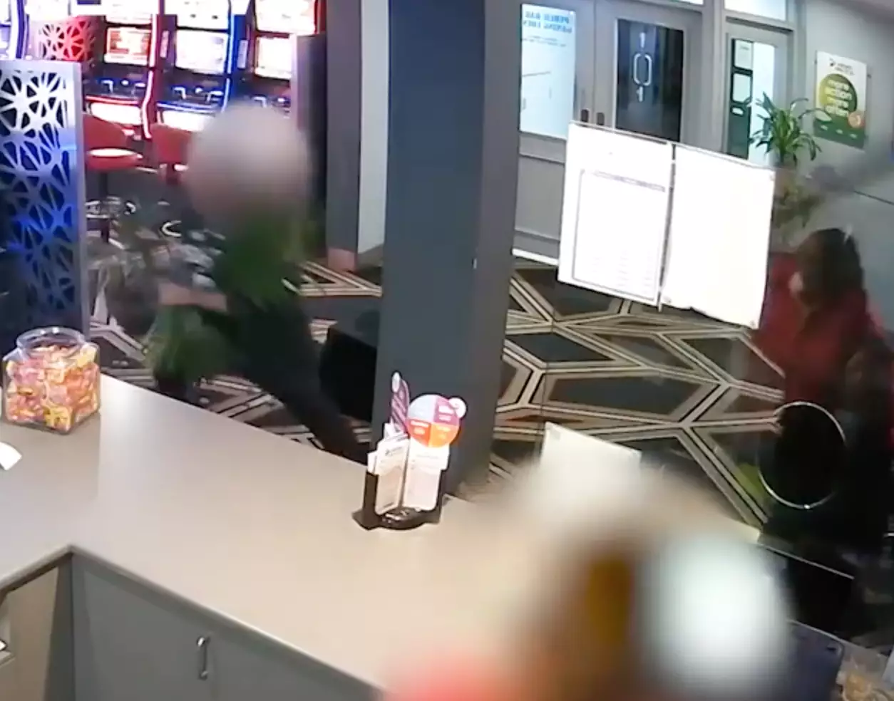 He even picked up a pot plant to stop the robbery.