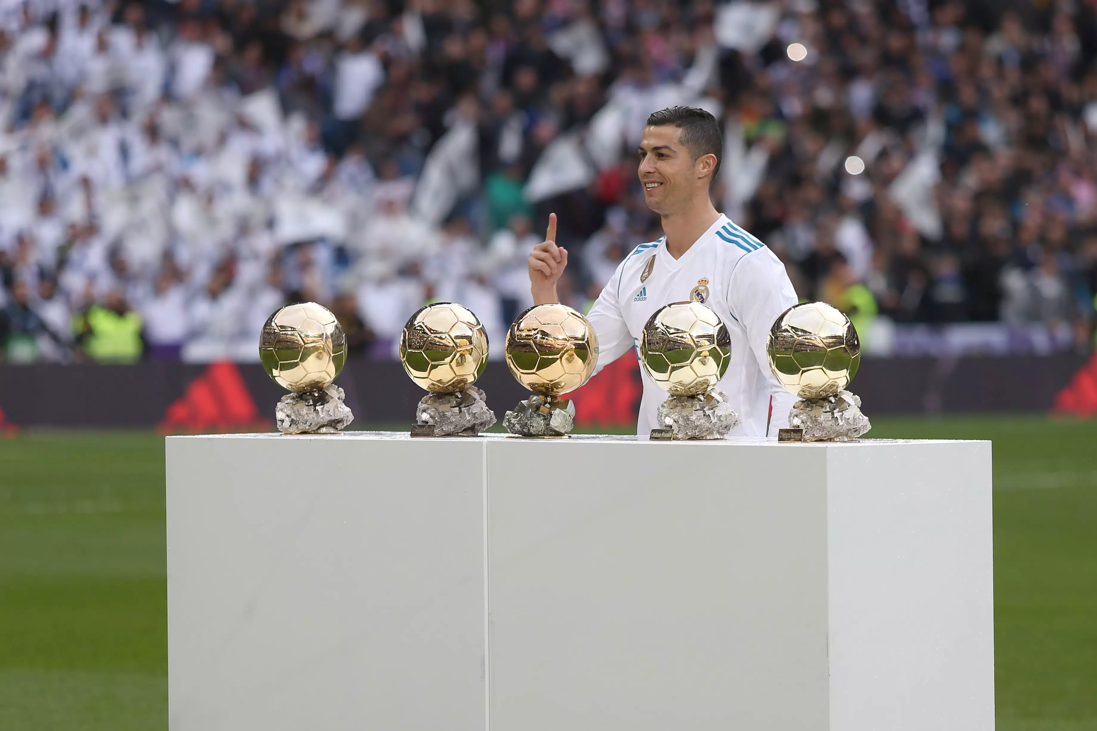Ronaldo with his Ballon d'Ors. Image: PA Images
