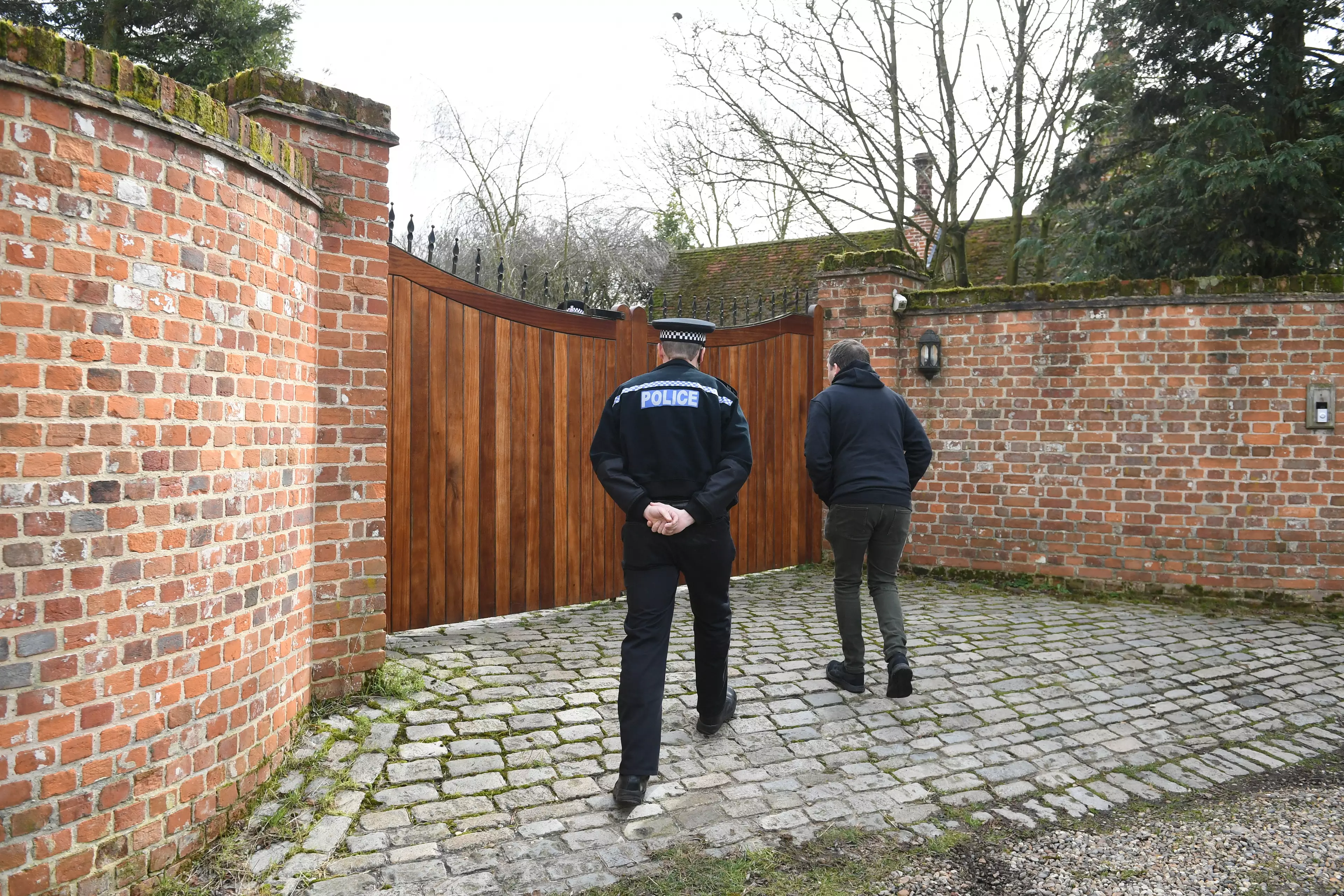 Police outside Keith Flint's house in Essex this morning.